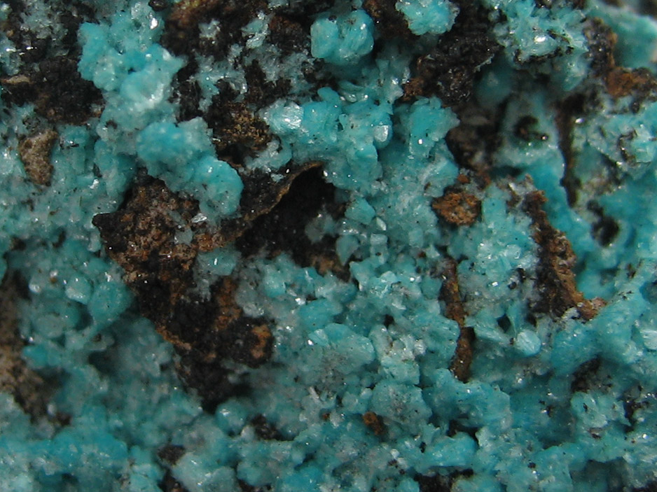 This is a macro image of aurichalcite, from Russia, which can be found on the MIROFOSS database.